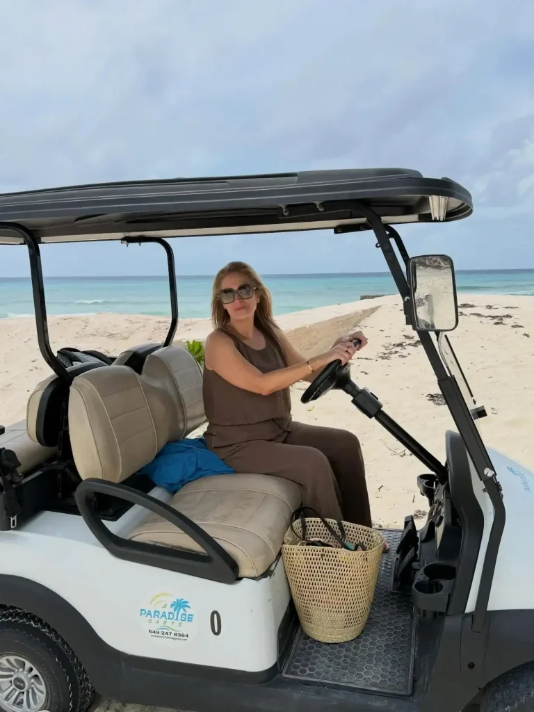 Tourist using Paradise Cart Golf Cart Rental in Turks & Caicos